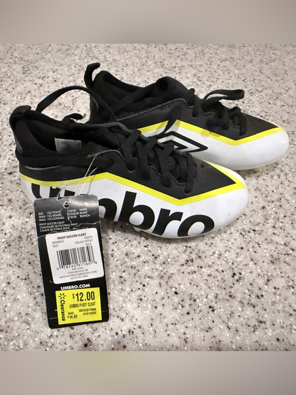 Umbro kids Black, White and Yellow Soccer Cleats